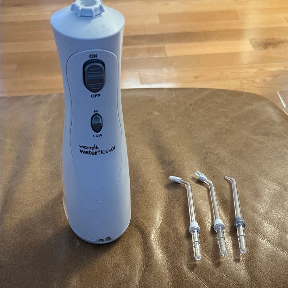 Rechargeable Waterpik Water Flosser with Tips